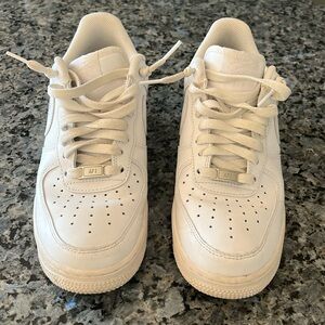 Nike Air Force 1 sneakers.  Men’s size 8.  Great used condition.